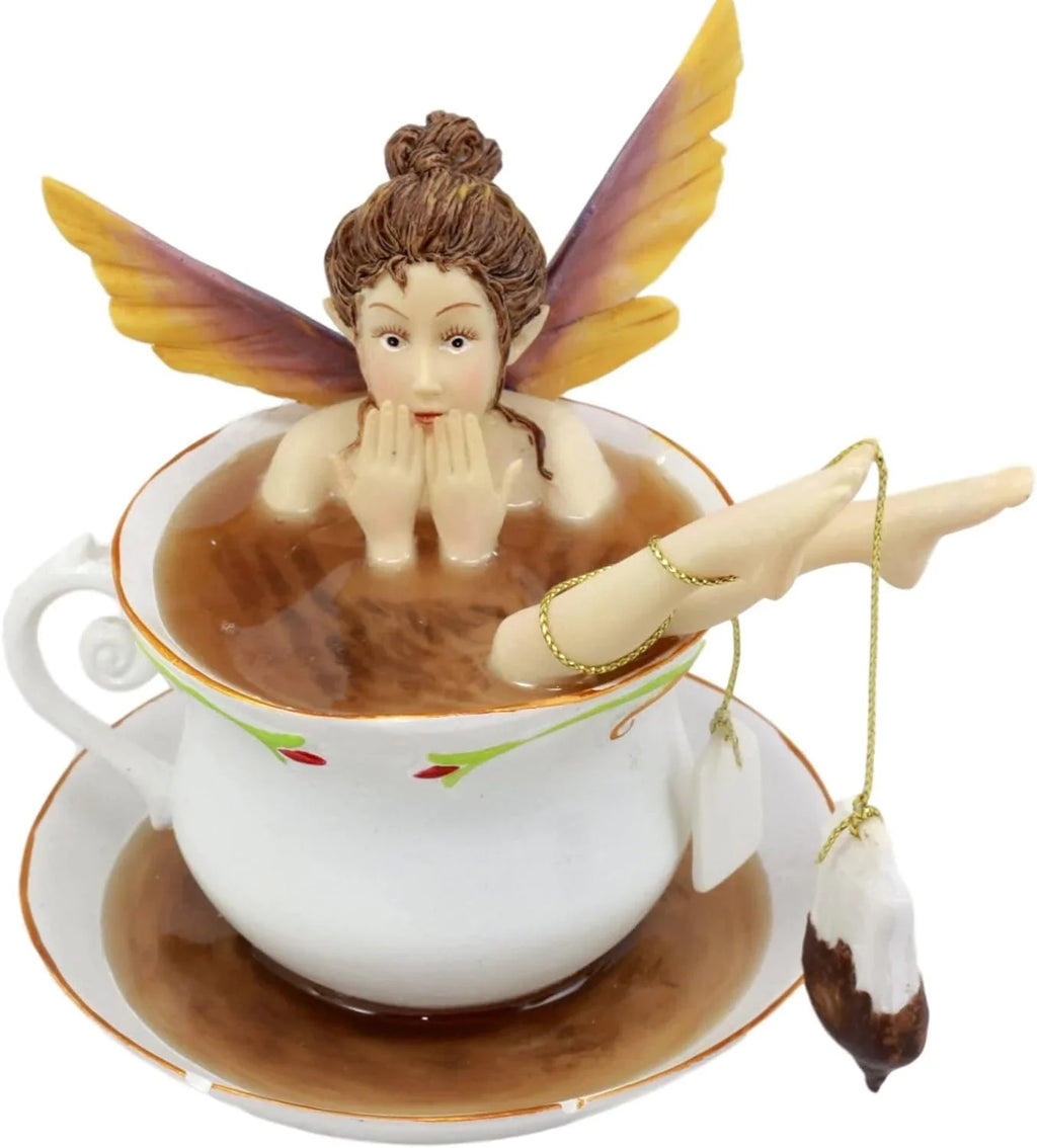 Ebros Magical Encounters Shocked Fairy Bathing In Tea Cup With Cracked Saucer Design Figurine 5" H Fantasy Collectible Tea Time Fairy With Tea Bag