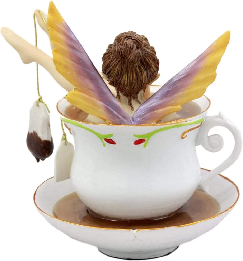Ebros Magical Encounters Shocked Fairy Bathing In Tea Cup With Cracked Saucer Design Figurine 5" H Fantasy Collectible Tea Time Fairy With Tea Bag