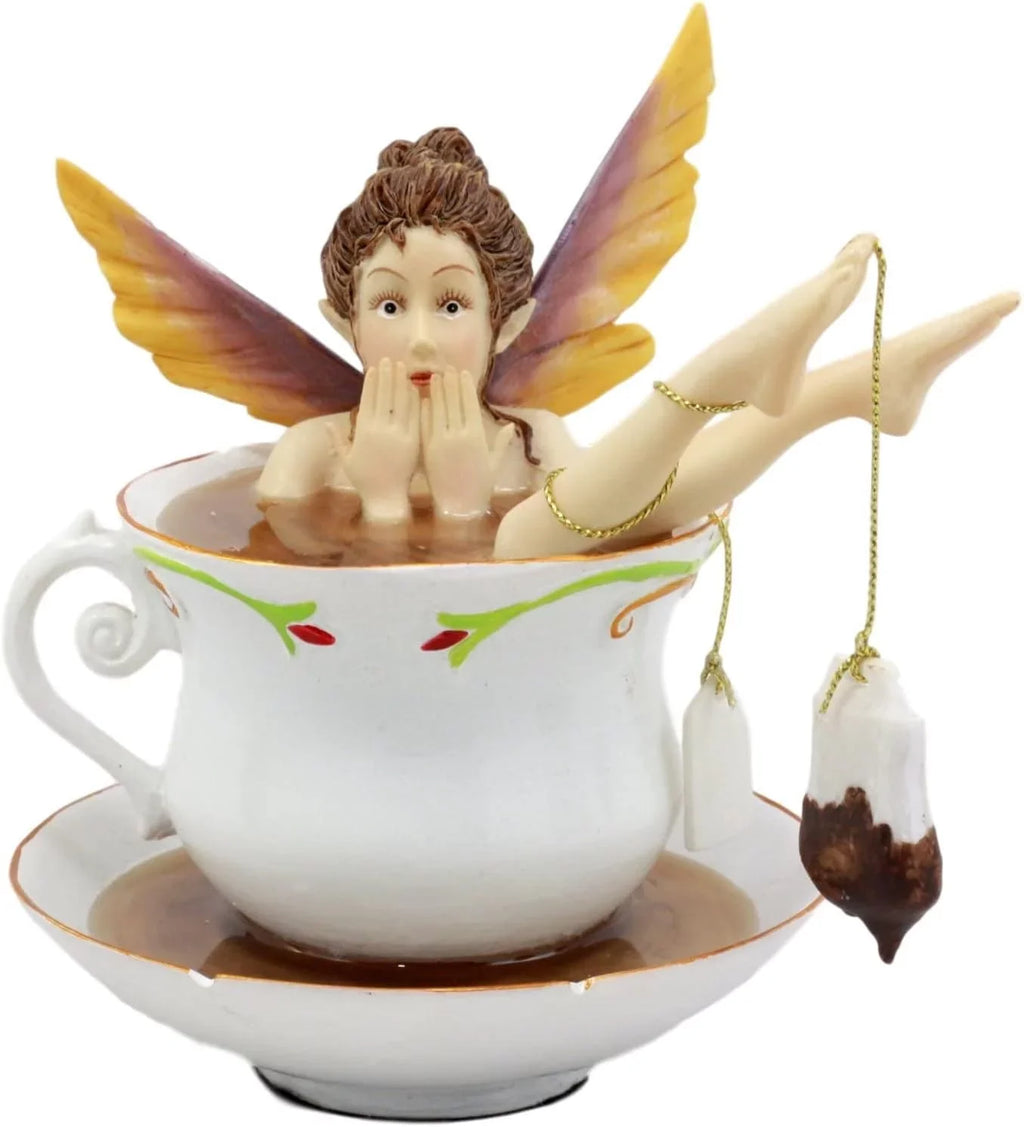 Ebros Magical Encounters Shocked Fairy Bathing In Tea Cup With Cracked Saucer Design Figurine 5" H Fantasy Collectible Tea Time Fairy With Tea Bag
